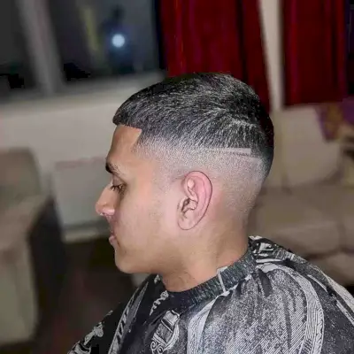 Short Hi-Top Fade with Shaved Lines
