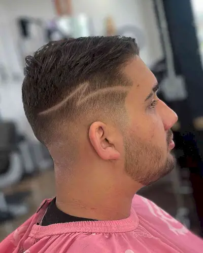 Short Fade Haircut with a Thunder Shaved Line