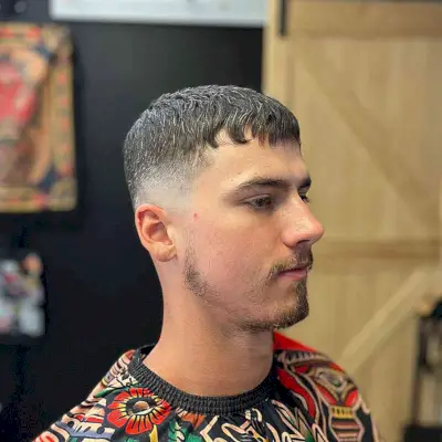 Short Faded Crop Cut with Short Wavy Bangs for Men