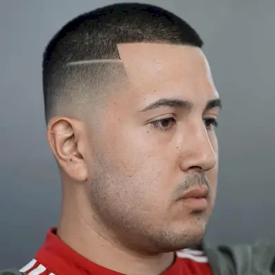 Stylish buzz cut with a hard part for dudes