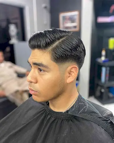 Medium-Length Low Fade and Comb Over Style for Men