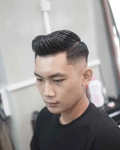 Ivy League with Low Taper Fade and Comb Over for Men