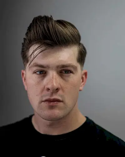 Low fade messy comb over