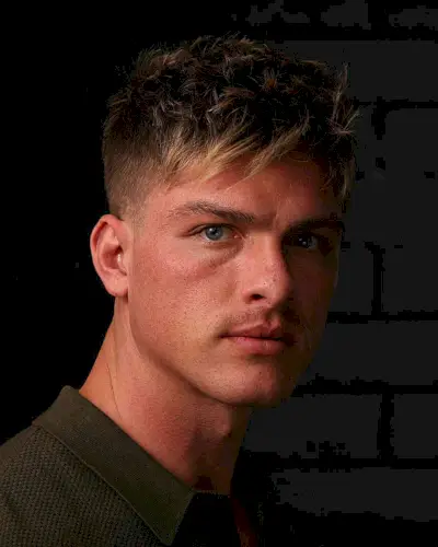 Textured Bangs Side-Swept Hairstyle with Faded Sides for Men