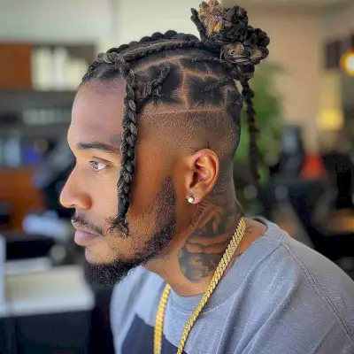 Box braids man bun