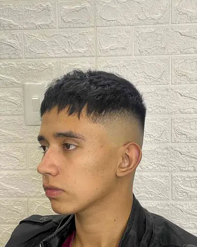 High Fade French Short Haircut with Choppy Bangs for Guys