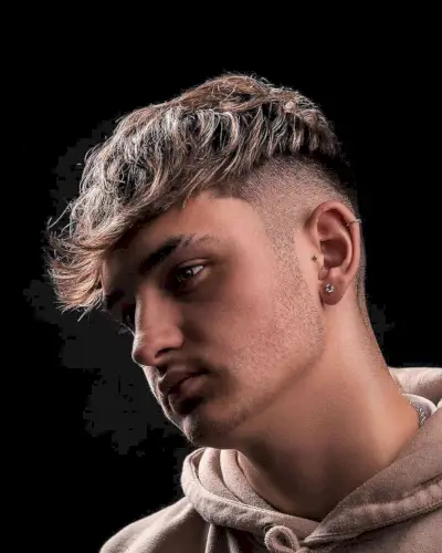 Shaved Sides and a Disconnected Long Top for Men with Thick Hair
