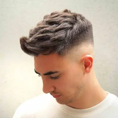 Textured top and disconnected undercut for coarser hair