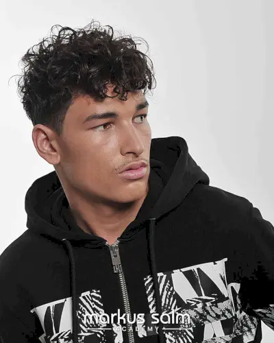 Naturally Thick Curly Hair with Tapered Sides for Men