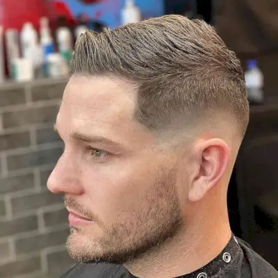 Classic Short Quiff with a Mid Skin Fade for Men