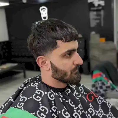 Tapered Edgar Haircut with Beard for Guy