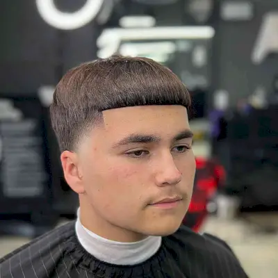 Edgar Bowl Cut with High Bald Taper and Blunt Bangs for Young Gentlemen