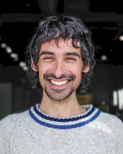 Cute and Messy Mullet with Bangs for Guys with Medium-Length Hair