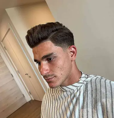 Mens Low Fade Side Part with Classic Tapered Sides for Medium Hair