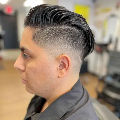 Slicked Back Hair with Shaved Sides