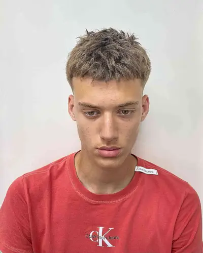 Short Tousled French Crop Hairstyle for Young Men