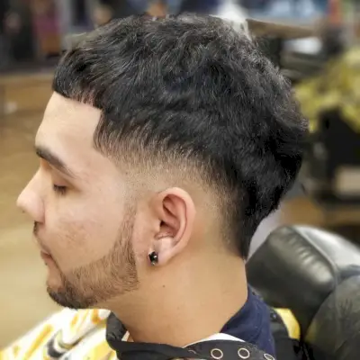 Messy hairstyle with line up for men