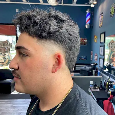 Textured Waves with a Medium Fade for Boys with a Mustache 