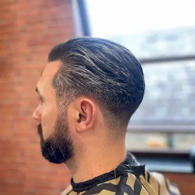 Sleek and Straight Low Taper Fade Hairstyle for Men