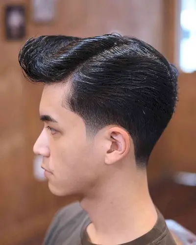 Low Faded Side Part Hairstyle for Young Men with Straight Hair