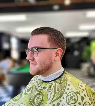 Classic Short Sleek Low Taper Fade Hair on guys with straight hair wearing glasses