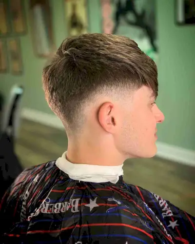 Low Drop Fade Haircut with Bangs for Men