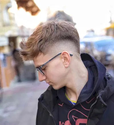 Black man with burst fade haircut