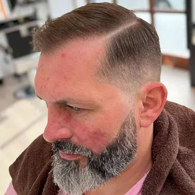 Thin Side-Swept Hair with a Taper Fade
