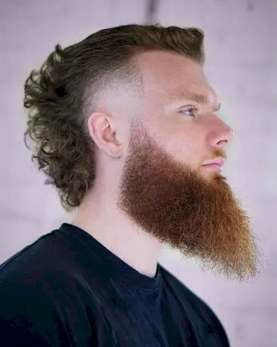 Curly Mullet Mohawk with a Beard for Guys