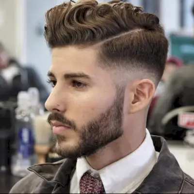 Stylish side part style for men with wavy hair