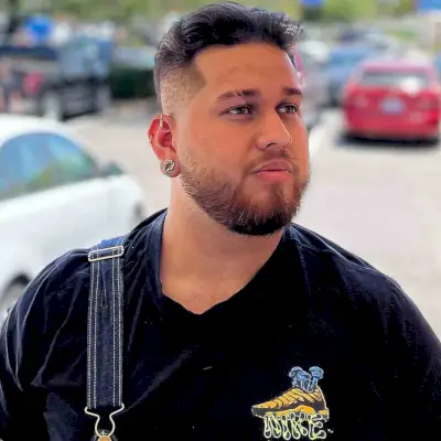 Wavy Brush Back Hairstyle with a Taper Fade Cut