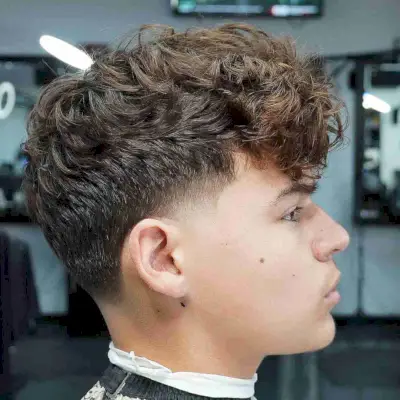 Taper Fade Haircut with Tousled Curls