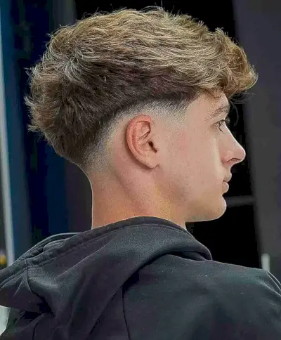 Short Low-Faded Choppy Haircut with Fringe for Young Men