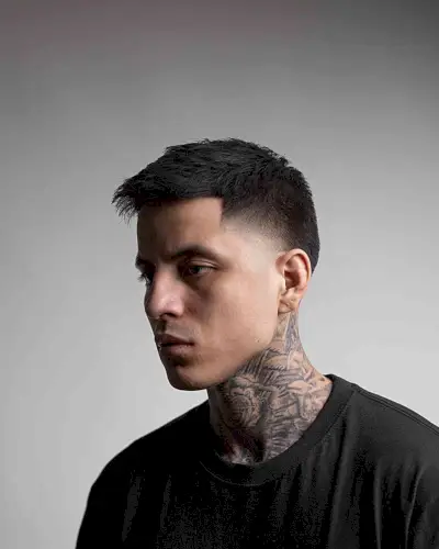 Side-Swept Style with Low Faded Sides and Line-Up for Men