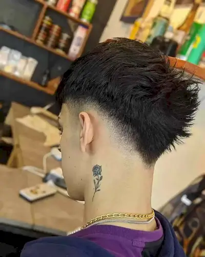 Low Fade V-Shaped Cut with Spiky Top on Men