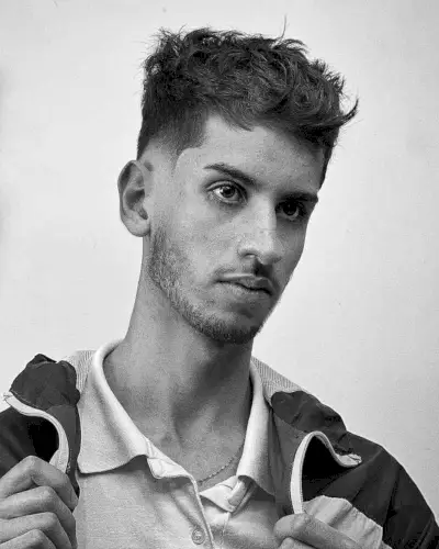 Stylish Low Fade with a Messy Top for Men