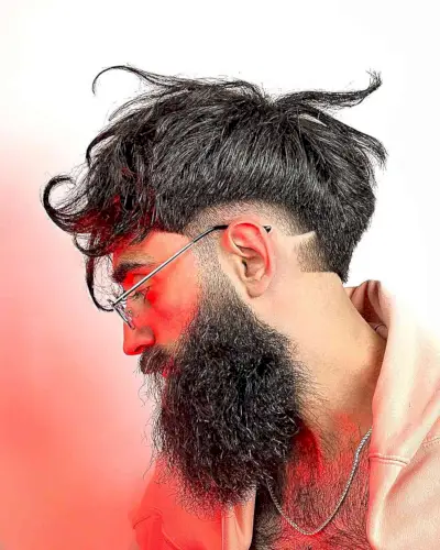 Low fade haircut with a beard