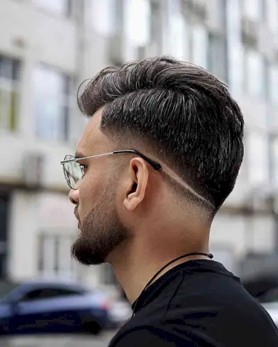 Side-Parted Low Fade Cut for Guys with a beard fade