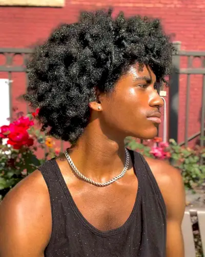 Voluminous afro for black men with kinky hair texture