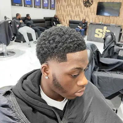 Picture of black man with twisted curls haircut