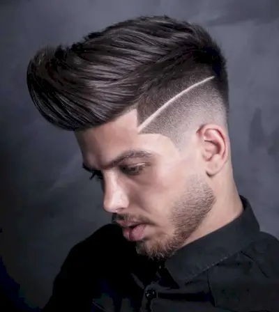 Faux hawk with disconnected high skin fade