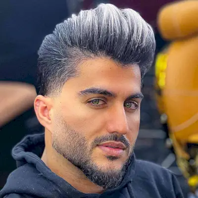 Silver Fox Pomp with a Fade for Men with thick hair and a beard