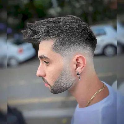 Sharp Skin Fade with Forward-Facing Spikes for Guys with Thick Hair