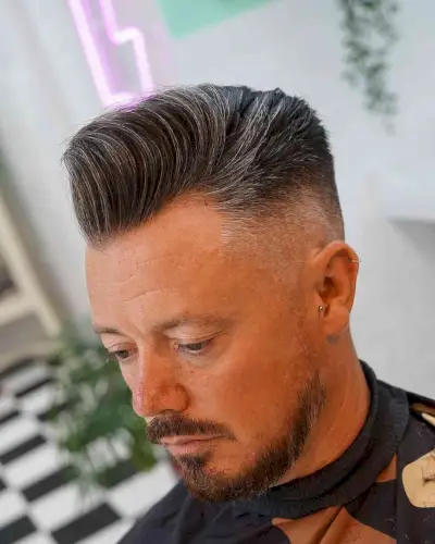 Popular Slicked Back Style with Skin Taper Fade
