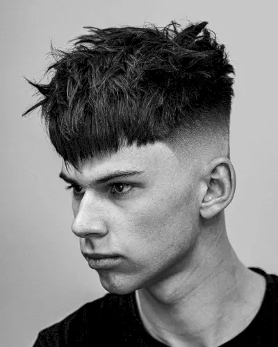 Jet Black Sharp Skin Fade with Choppy Fringe for Men