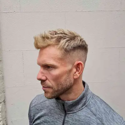 Blonde Spiky Top with a Skin Fade for Men