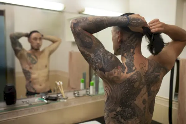 Man med tatueringar sista ord