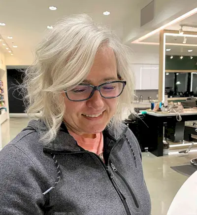 Curly Chin Bob with Platinum Highlights for Fine-Haired Ladies Aged 50