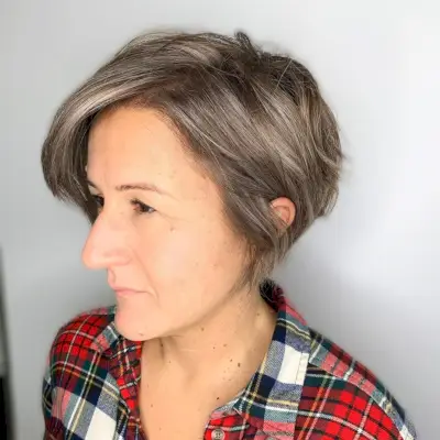 Very Short Layered Cut with Bangs for Women Over Fifty