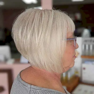 Stacked and Inverted Bob with Bangs for Women in their 60s with fine hair